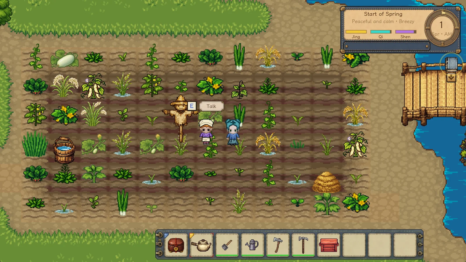 The player beside a field with the hotbar and core interface visible